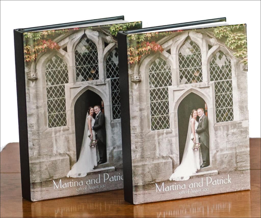 Two Half Size Parents Wedding Albums standing up on a table